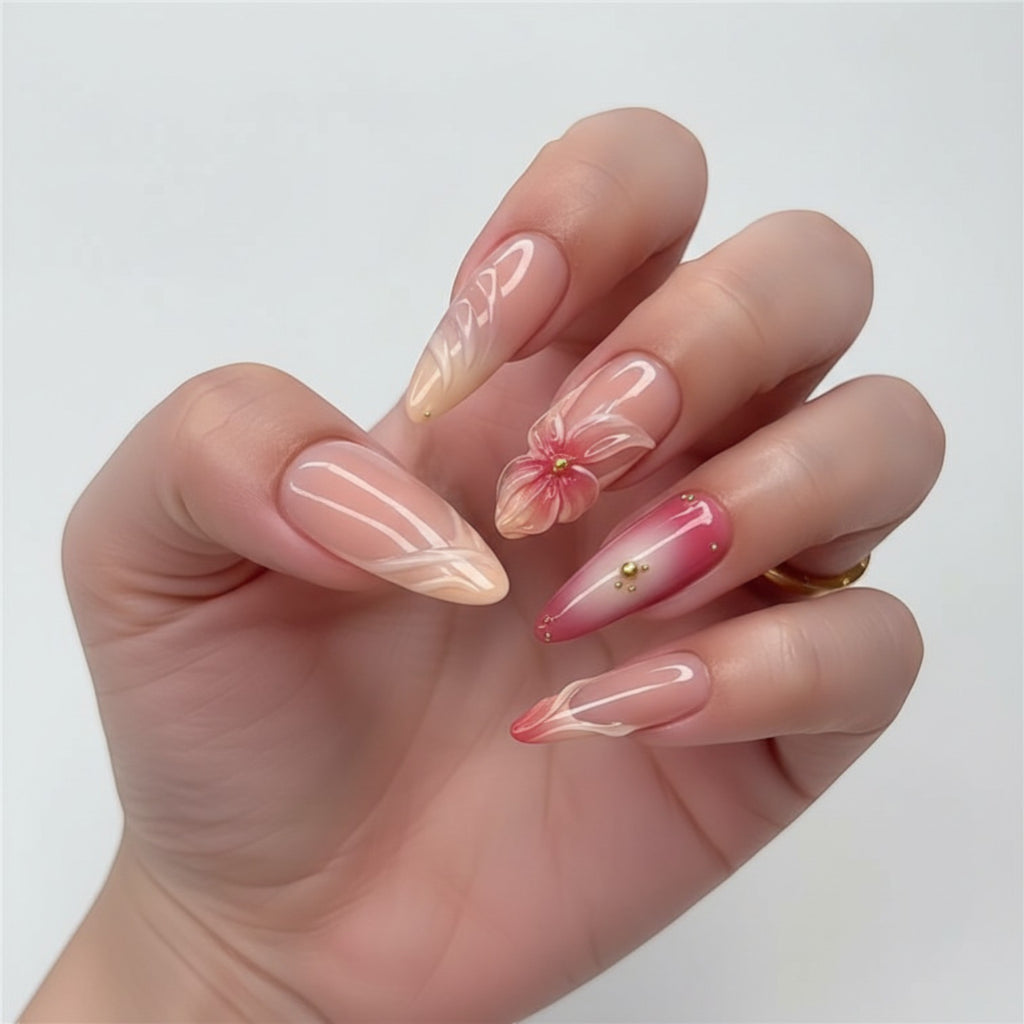 Aurapal Aura29 press-on nails with 3D floral design, pink and nude gradient, gold accents.