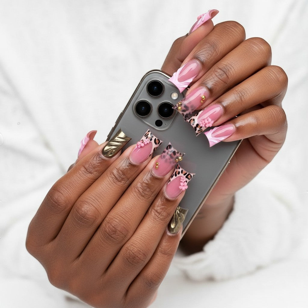 Aurapal Aura65 press-on nails with pink, leopard print, gold metallic finishes, and 3D floral accents.