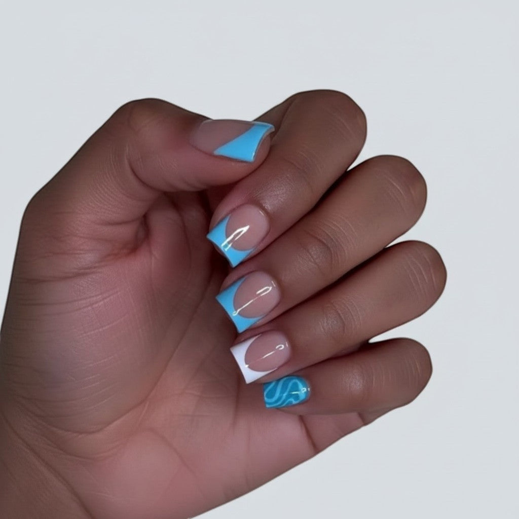 Press Aura15 by AuraPal: Blue and white abstract swirl French tip press-on nails with a glossy finish.
