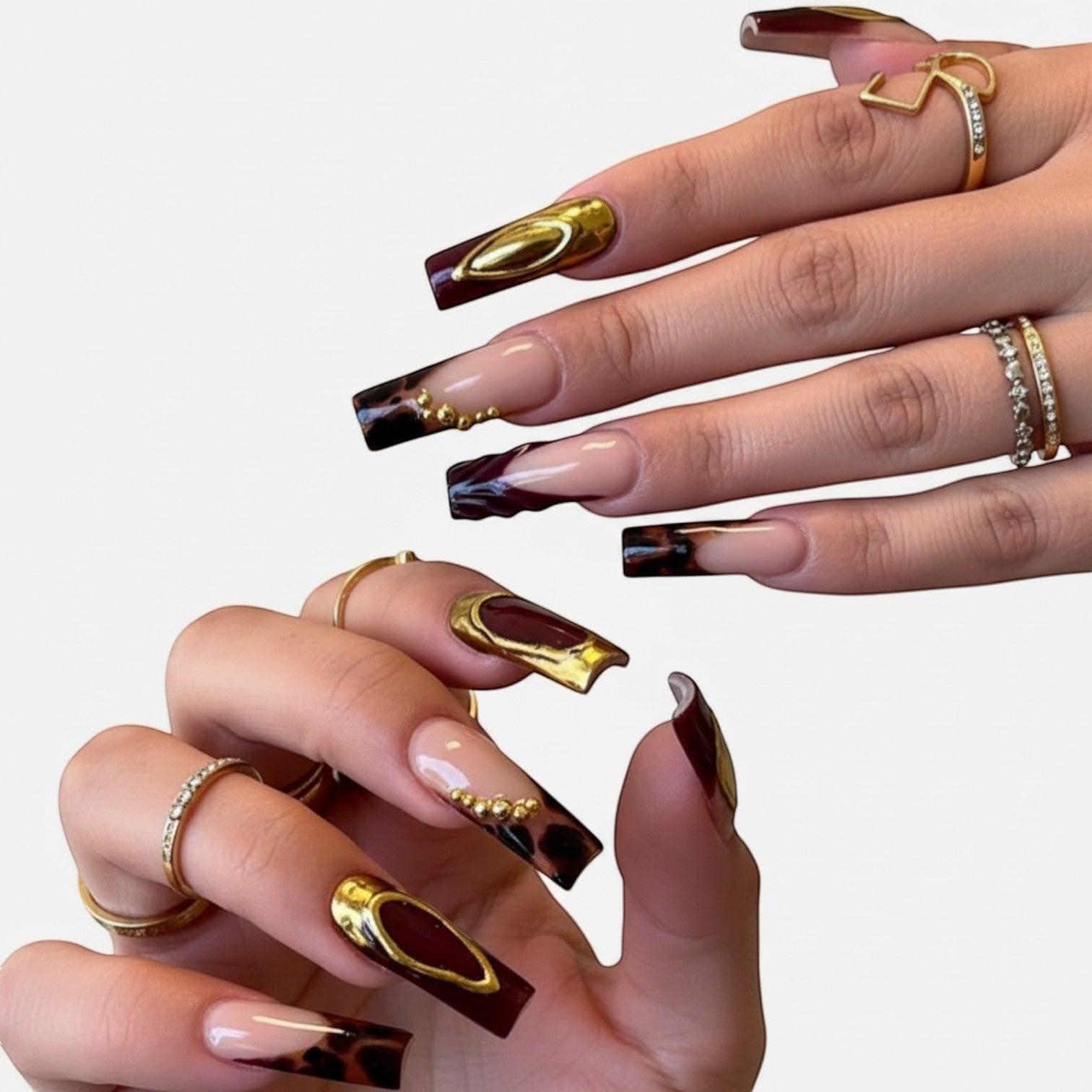 Aurapal long square press-on nails featuring burgundy, animal print, and gold metallic accents with stud details.