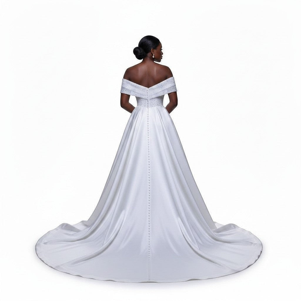 Aurapal off-shoulder white bridal gown with beaded bodice, detachable train, and button-down back detail.
