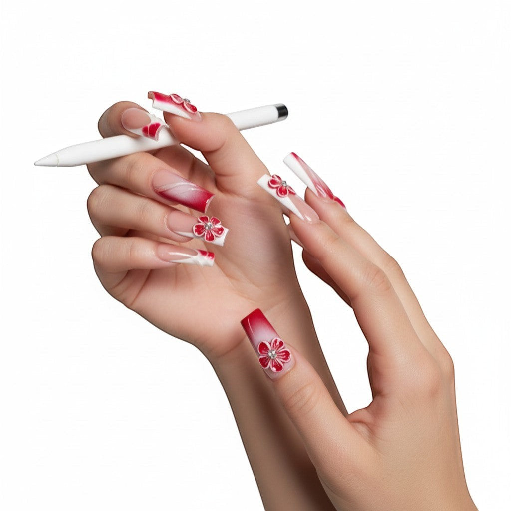Press Aura14 by AuraPal: Red and white French tip press-on nails with 3D floral accents and ombre design.