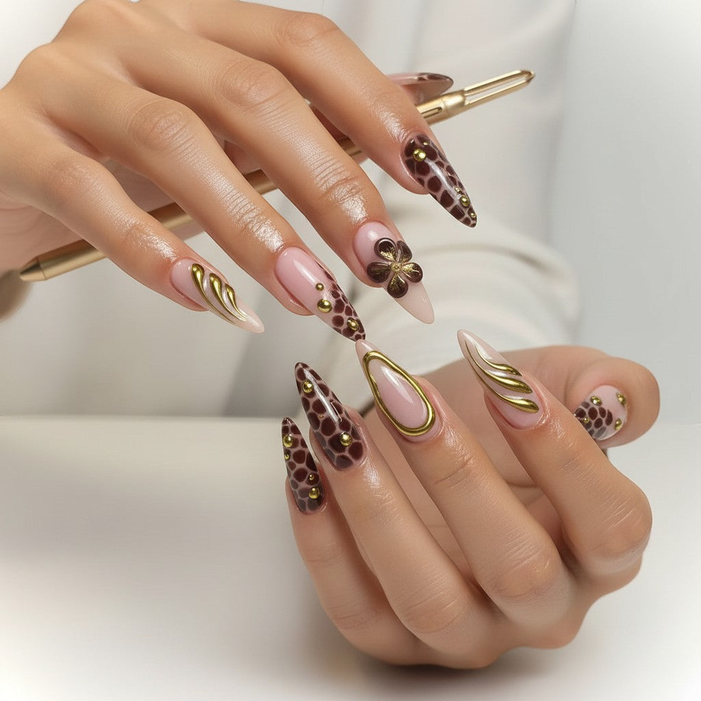 Aurapal Aura67 stiletto press-on nails with brown animal print, gold accents, and 3D flowers.