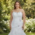 Aurapal plus-size strapless white mermaid wedding dress with crystal beadwork, ruched bodice, and ruffled skirt.