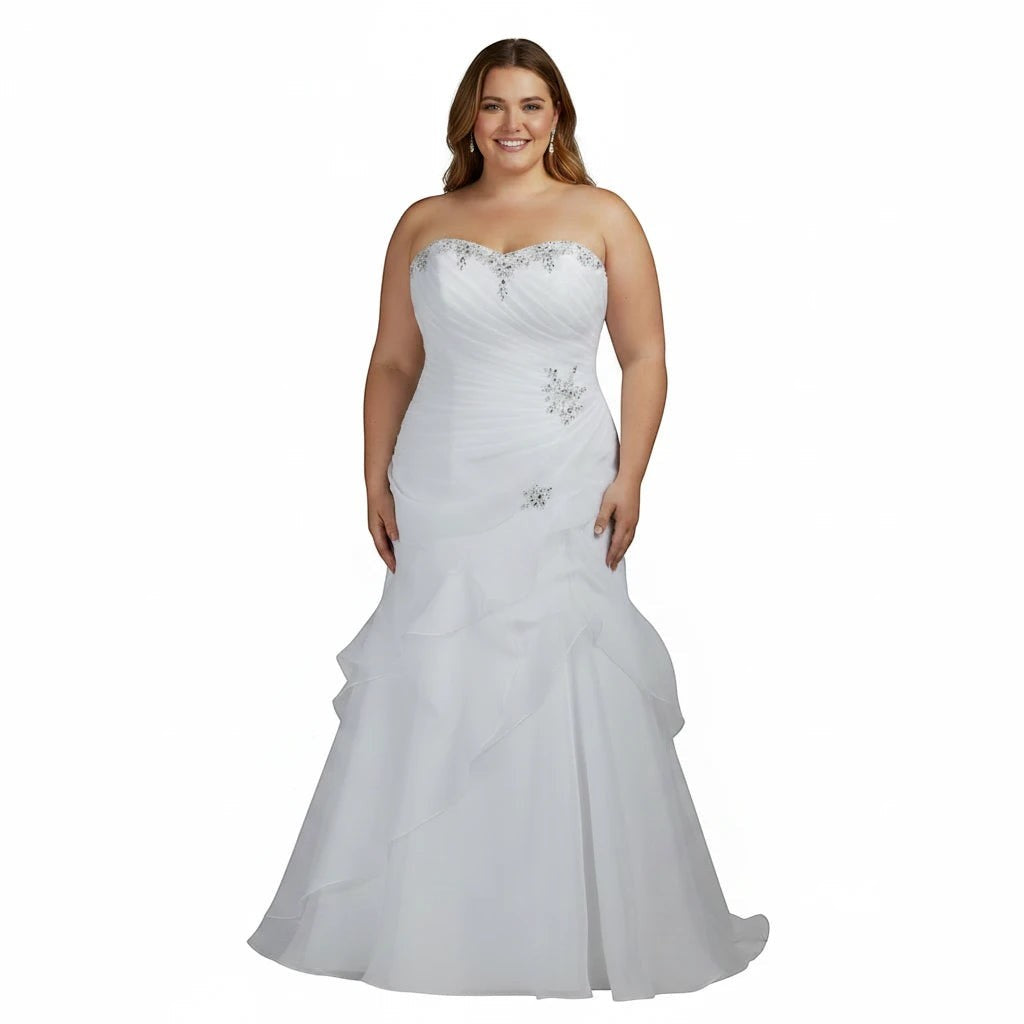 Aurapal plus-size white strapless mermaid wedding dress with a ruched bodice, crystal beadwork, and ruffled skirt.
