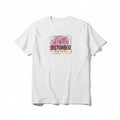 Aurapal white cotton crewneck t-shirt featuring a pink and orange watercolor graphic with gold frame and text.