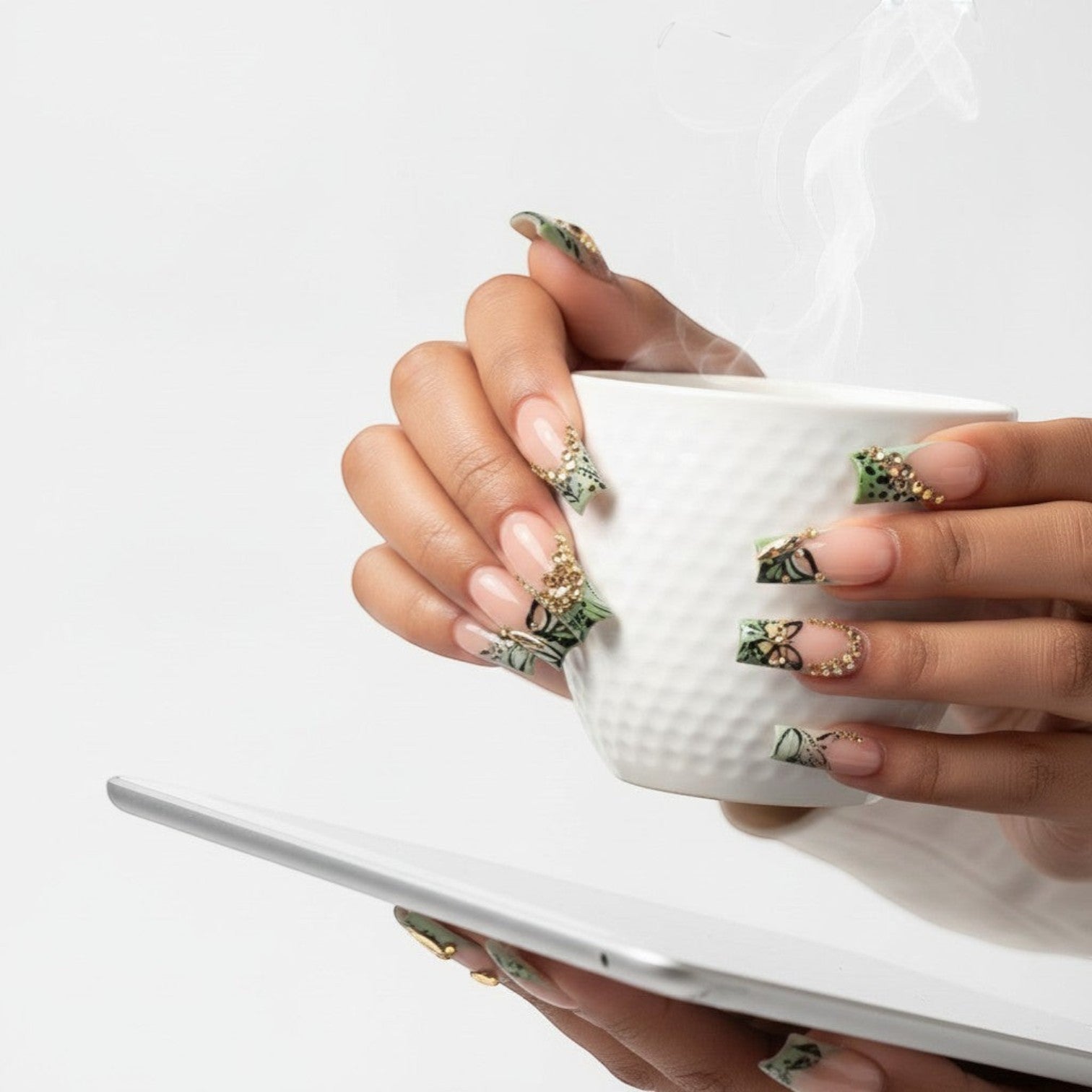AuraPress20 press-on nails with green, black, and nude French tips, adorned with rhinestones and butterfly designs.